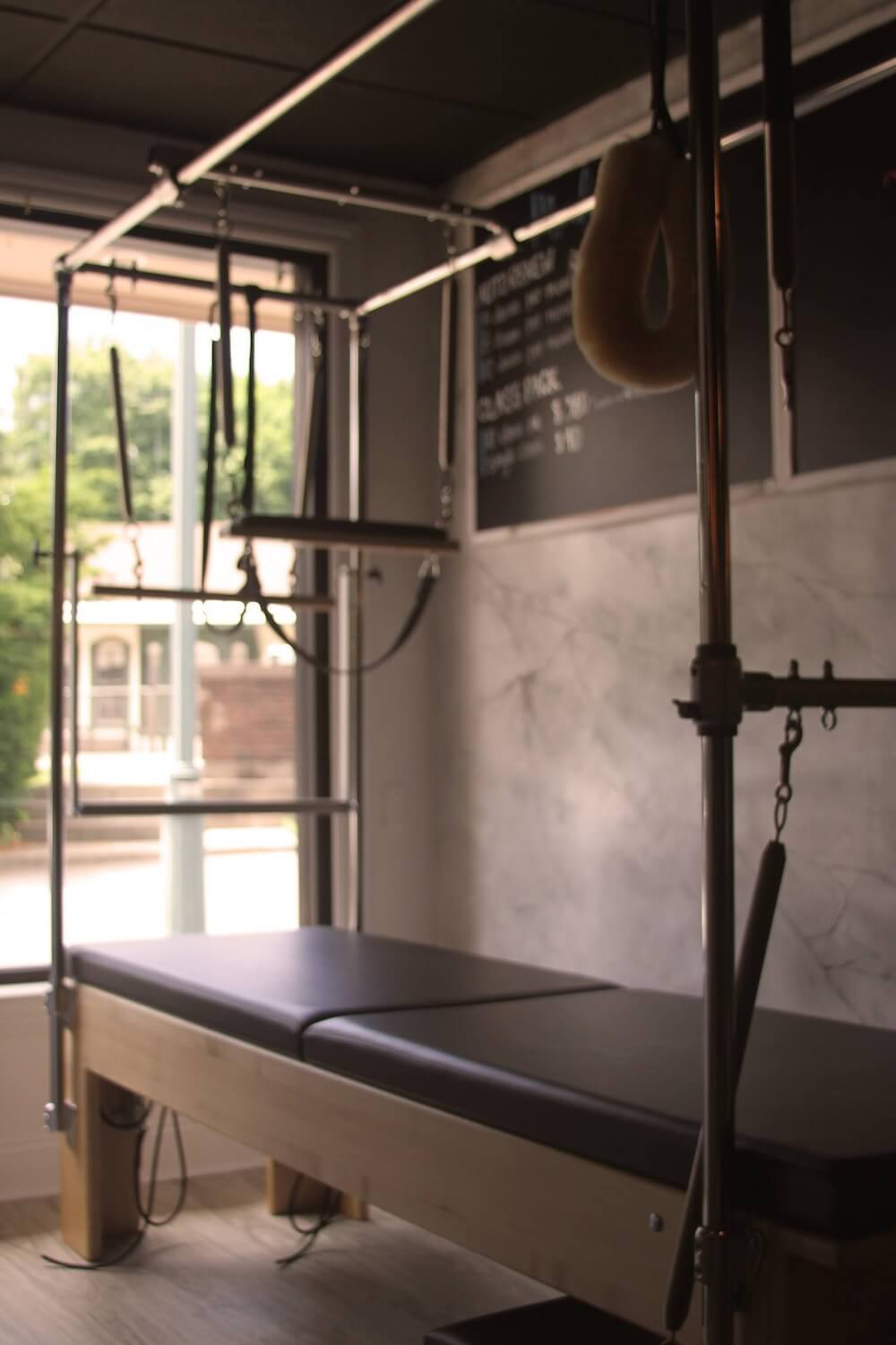 Small group Pilates reformer class at CS Fit Pilates